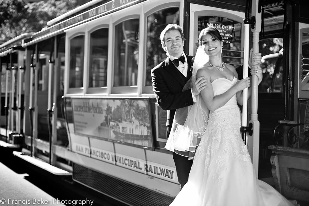 bride and groom on california street cable car