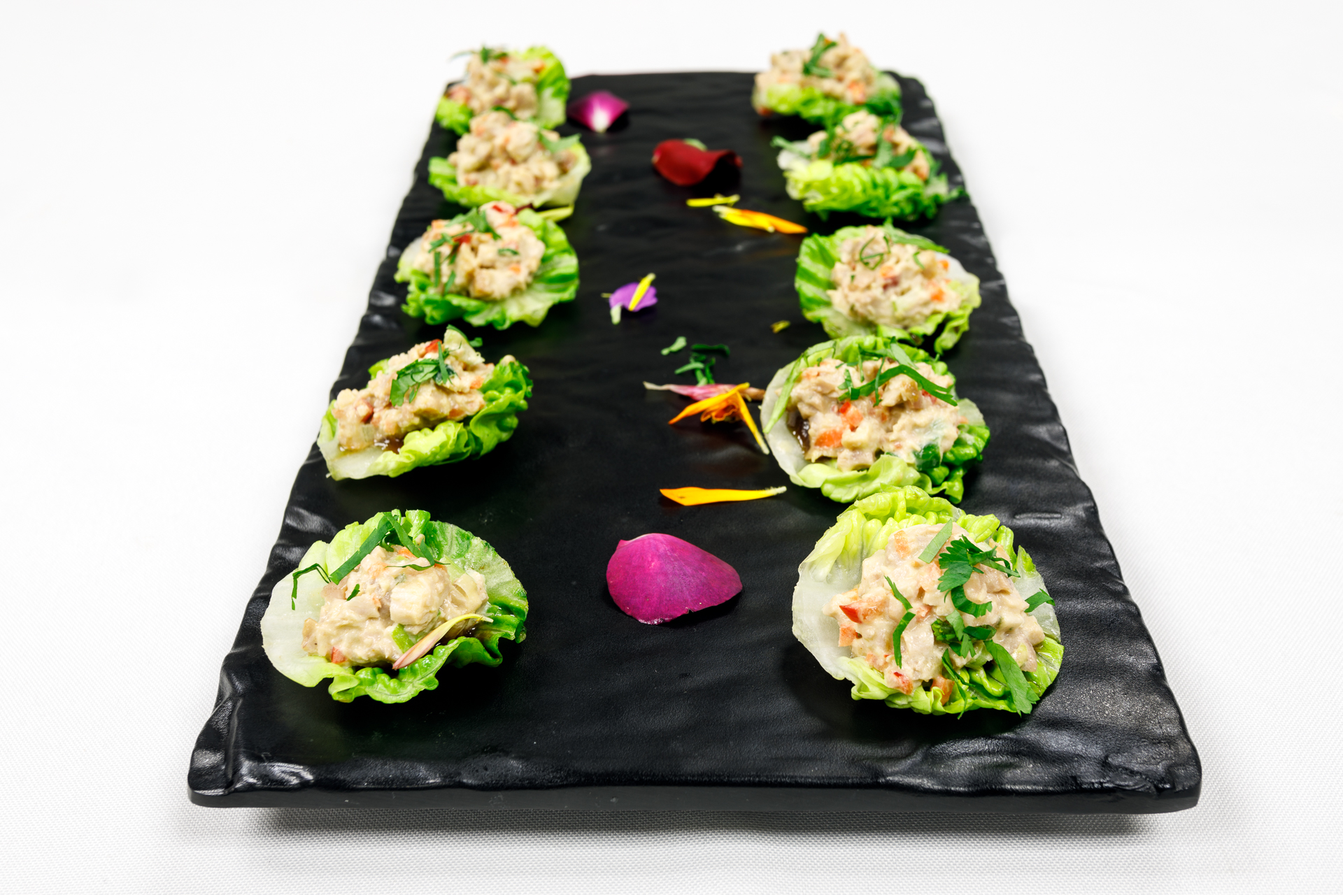asian chicken salad in a lettuce cup